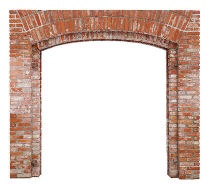 The arch for the gate of the village barn is made of red bricks isolated