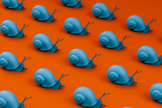 Illustration of blue snails on red background