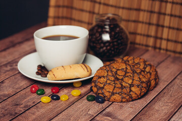 sweets and cookies for tea on a wooden table breakfast dessert