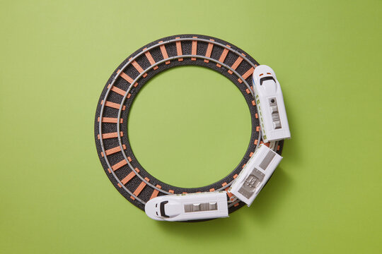 Round railway with plastic train toy.