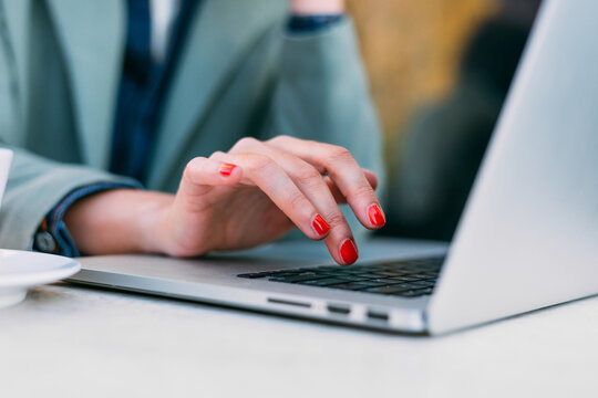 Close up of a Woman Using a Laptop