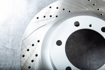 improved Perforated brake discs on dark gray background