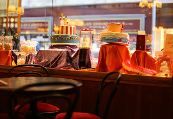 Showcase with sweets in the cozy cafe