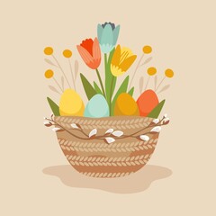 easter basket with yellow orange and blue tulips and festive eggs decorated with a branch pussy-willow