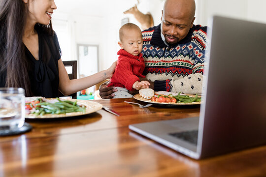 Young Family Staying At Home For The Holidays