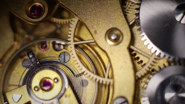 working clockwork gears (clock mechanism) inside a vintage clock