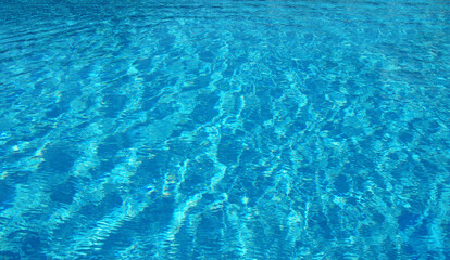 Surface of blue pool.