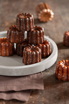 Canel&eacute; - French pastry on a grey plate