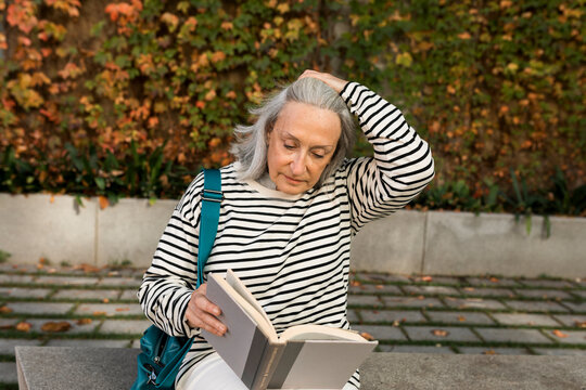 Mature woman daily routine in Barcelona, commute, tai-chi and grocery shopping in the city