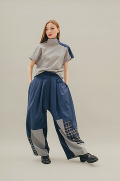 Slim Model In Baggy Patchwork Clothes