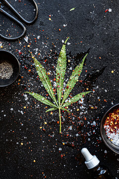 Cannabis leaf with spices and oil