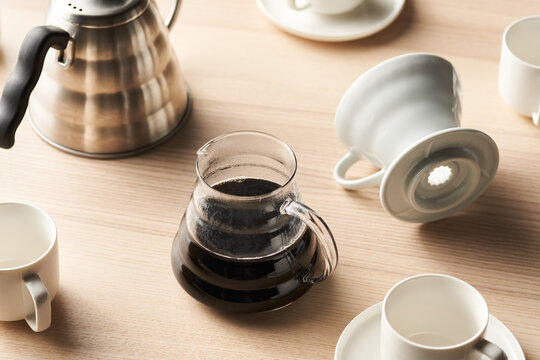 Jug of coffee near pour over set