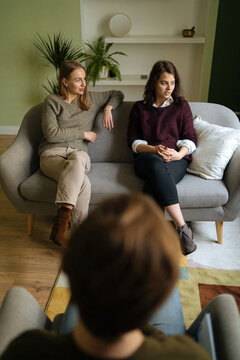 Women sharing problems with therapist