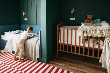 A little boy in a cozy room.