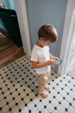 A little boy in a cozy room.