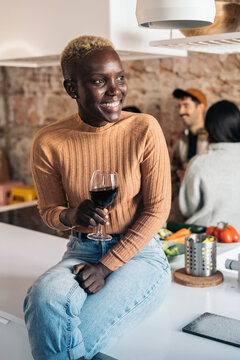 Afro Woman Having Glass of Wine