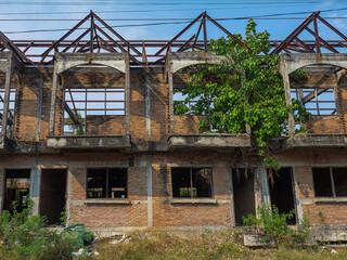 abandoned building by front perspective of unfinished house with degenerate structure detail of metal brick and concrete the real estate problem from economic crisis and covid 19 pandemic
