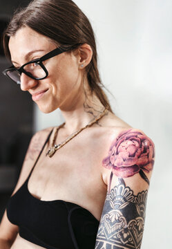 A girl with a newly made flower tattoo.