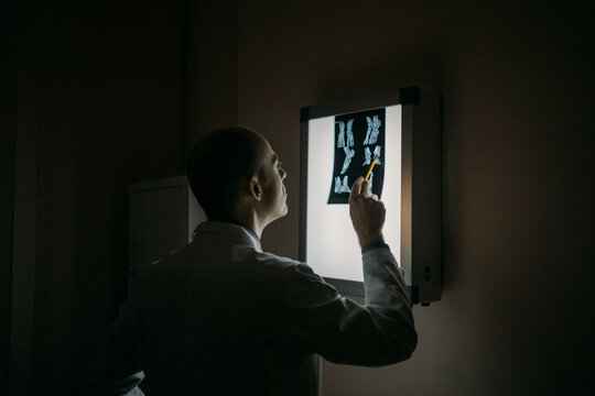 Doctor examining an X-Ray