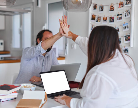 Young couple working from home
