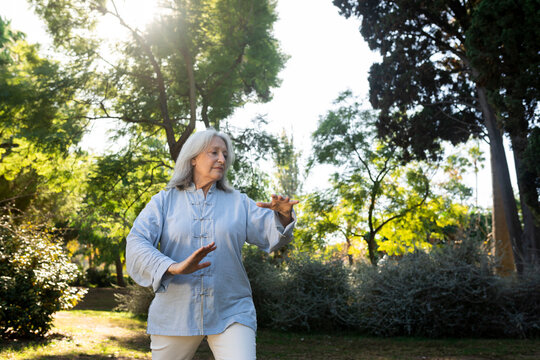 Mature woman daily routine in Barcelona, commute, tai-chi and grocery shopping in the city