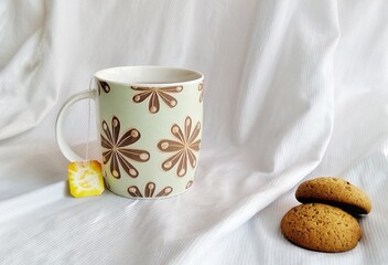 Tea and cookies white background