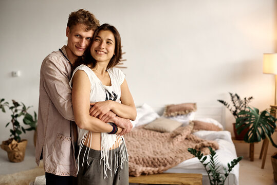 Spending nice time at home. Beautiful young loving couple