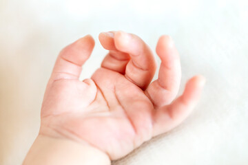 Close up of newborn baby hand