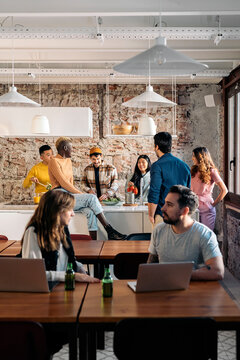 Colleagues Having Snack in Coworking
