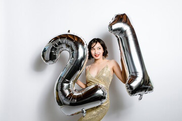 Asian Woman Celebrates with Big Balloons