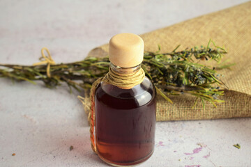 Rosemary in a glass bottle. Natural, with many properties and versatile.