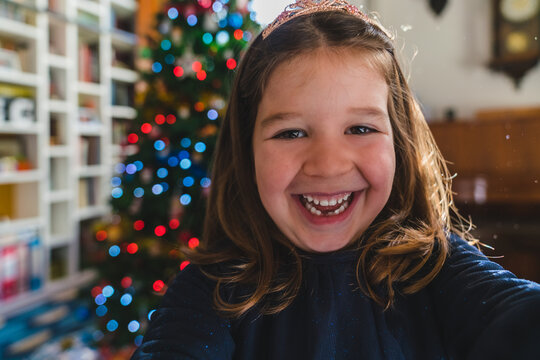 Happy Little Girl during Christmas at Home