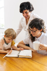 Female couple with son studying