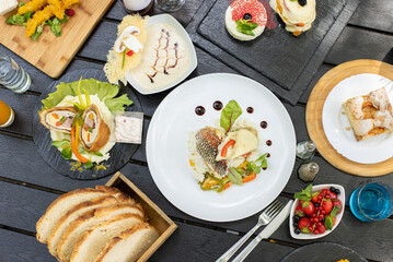 details of tasty brunch with chicken, tomato and desert