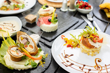 details of tasty brunch with differente plates