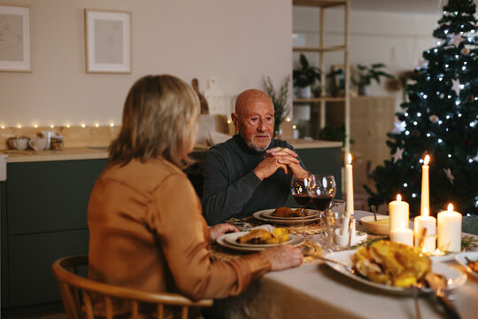 Retired couple having Xmas dinner at home