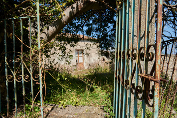 blue iron entrance gate in the countryside
