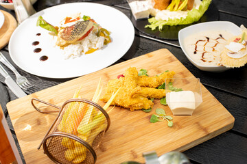 details of tasty brunch with chicken, tomato and desert