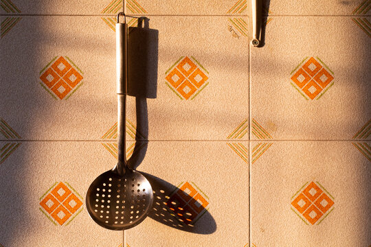 laundry ladle hung on the wall