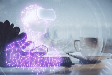 Double exposure of vr glasses drawing and desktop with coffee and items on table background. Concept of Augmented reality.