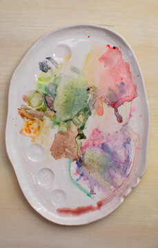 Ceramic palette with watercolor stains