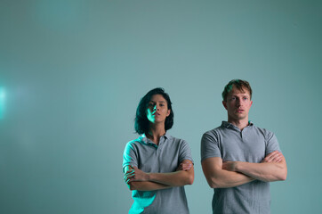 Strong man and woman face. Couple in love. Photo. Idea. Light studio. Idea