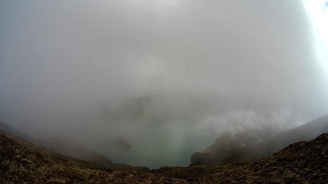 Time lapse of the caldera of Lagoa do Fogo, at S&atilde;o Miguel Island (Azores), on a windy day.	