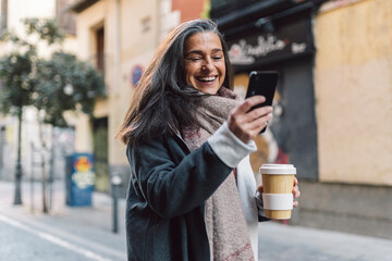 Middle Aged Woman Using Phone