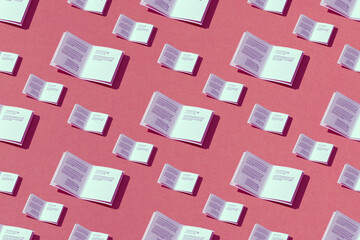 Open books make by paper craft isolated seamless pattern on color background