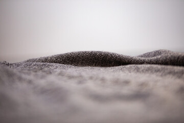 
macro texture of gray fleece and velor blanket