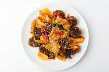 Stir-fried pork intestines on white background