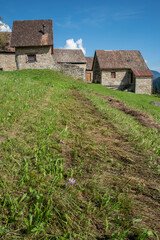 Fototapeta na wymiar Ancient landscapes of Carnia. Stables and hay depots Orias.