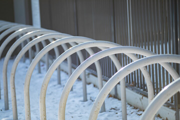 
metal bicycle racks in the winter park