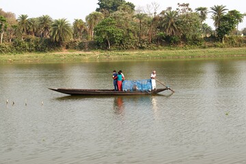 Fototapeta na wymiar boat riding on river 
